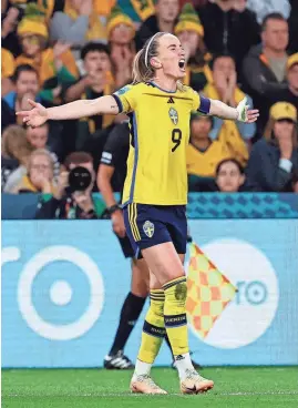  ?? ?? Sweden’s Kosovare Asllani celebrates after scoring her team’s second goal during the Women’s World Cup third-place match against Australia on Saturday in Brisbane, Australia.