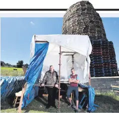  ??  ?? Brothers Mark and Hayden at the bonfire in Ballyduff, Newtownabb­ey