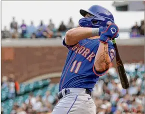  ?? Jeff Chiu / Associated Press ?? New York’s Kevin Pillar watches his three-run home run — his 10th of the year — against the Giants, his former team, during the 12th inning.