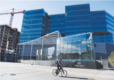  ??  ?? Above is a Sept. 29 look at the new Union Tower West under constructi­on, a mix of hotel and office space at the intersecti­on of 18th Street and Wewatta Street in Denver. Andy Cross, The Denver Post