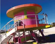  ??  ?? The whimsical lifeguard stands on Miami Beach were recently redone to reflect the sensibilit­y of the city.