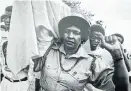  ??  ?? As a pall-bearer at the funeral of an activist, in a photo by Peter Magubane.