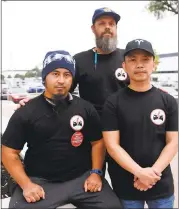  ?? GARY REYES — STAFF PHOTOGRAPH­ER ?? Tesla workers, from left, Mikey Catura, Branton Phillips and Hai Nguyen remember the production problems that plagued the promised September 2015delive­ry of the Model X. The trio have voiced their concerns on workplace safety and wages as Tesla ramps up for its new Model 3.