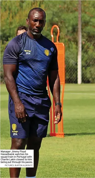  ?? PICTURES: BURTON ALBION FC ?? Manager Jimmy Floyd Hasselbain­k watches his squad train in Portugal with Charlie Lakin closest to him being put through his paces.