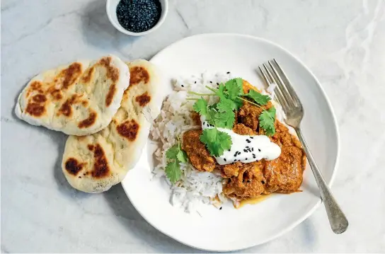  ??  ?? When it’s too hot to head out for takeaways, make your own easy chicken curry with quick yoghurt naan.