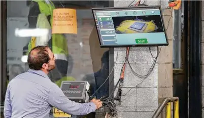  ?? Michael Wyke / Contributo­r ?? Cargo Spectre has adapted video game technology for a system of scales, cameras and 3D scanners to instantly measure and record the weight and dimensions of freight.