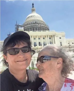  ?? BRITT KENNERLY/USA TODAY NETWORK ?? With no one around to take a photo on a hot July day, Britt Kennerly and her mother, Helen, opt for a selfie at the U.S. Capitol.