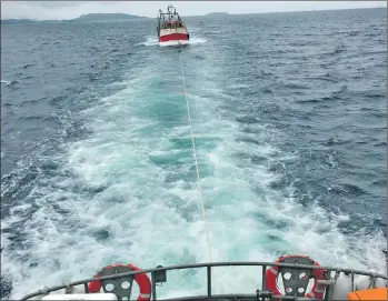  ??  ?? The lifeboat towed the fishing vessel for 43 miles back to Oban.