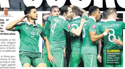  ??  ?? GLORIOUS Ireland players celebrate Shane Long’s goal against the Germans