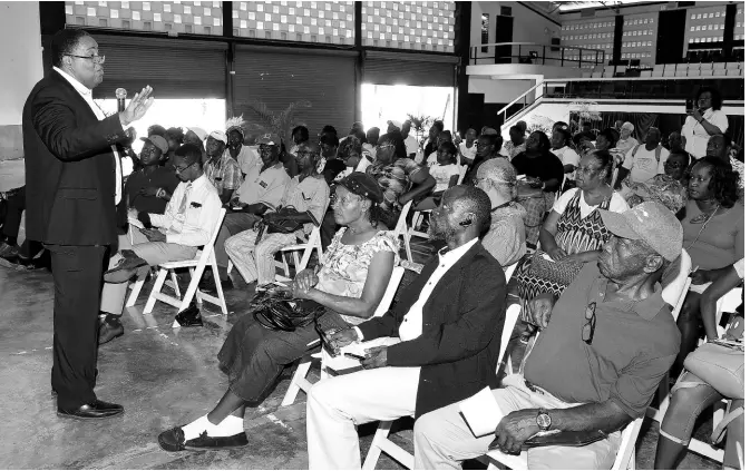  ?? CONTRIBUTE­D ?? Dean of Science and Technology at The University of the West Indies, Mona, Professor Michael A. Taylor (left), addresses a Farmers’ Month public lecture at the University of Technology in St Andrew on Wednesday.