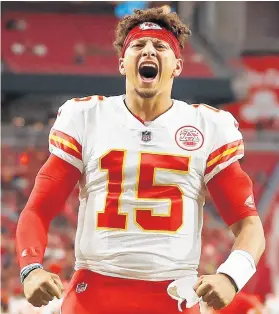  ?? CHRISTIAN PETERSEN/GETTY ?? Chiefs quarterbac­k Patrick Mahomes reacts before the start of a preseason game against the Cardinals on Aug. 20 in Glendale, Ariz.
