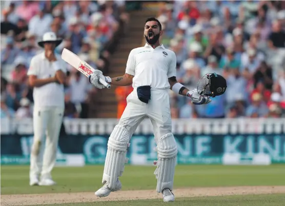  ?? AFP ?? India’s Virat Kohli celebrates after reaching the century mark on Day 2 of the first Test against England at Edgbaston. Kohli top-scored with 149