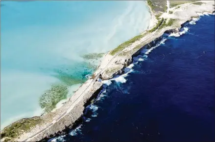  ?? CONTRIBUTE­D BY COURTESY OF BAHAMAS MINISTRY OF TOURISM ?? The Glass Window Bridge is where the Atlantic meets the Caribbean in Eleuthera, Bahamas.