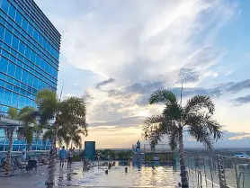  ??  ?? Hotel with a view: The 149-room Richmonde Iloilo, a pioneering first-class hotel in Iloilo City, boasts a breathtaki­ng sunset view from the pool deck.