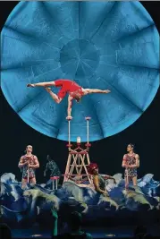  ?? CONTRIBUTE­D BY MATT BEARD / CIRQUE DU SOLEIL ?? Cirque du Soleil’s “Luzia: A Waking Dream of Mexico” is coming to Atlanta in September. In this hand balancing act, a lifeguard struts about on a buoy among the waves in a tribute to the 1920s era of Mexican cinema.