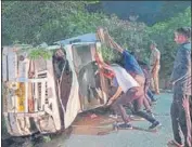  ?? PARVEEN KUMAR/HT PHOTO ?? After the smugglers threw several cows off the moving van, they lost control of the vehicle, which overturned on the Golf Course Extension Road in Gurugram on Thursday.