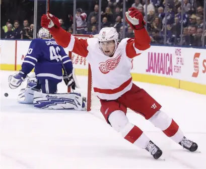  ?? STEVE RUSSELL TORONTO STAR ?? Detroit’s Dylan Larkin, robbed earlier by Leafs goalie Garret Sparks, celebrates his overtime winner at Scotiabank Arena.