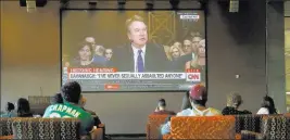  ?? Ross D. Franklin ?? The Associated Press College students at Arizona State University in Phoenix watch the Senate Judiciary Committee hearing Thursday as Supreme Court nominee Brett Kavanaugh testifies.