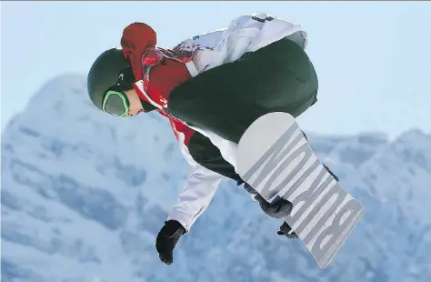  ?? SERGEI GRITS/THE ASSOCIATED PRESS FILES ?? Mark McMorris takes a jump during the men’s snowboard slopestyle final at the 2014 Winter Olympics in Krasnaya Polyana, Russia, in 2014. Today McMorris is one of the best-known competitiv­e snowboarde­rs.