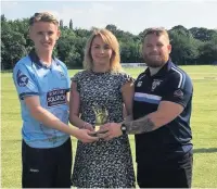  ??  ?? ●●Jack Duffy and Aidan Gleeson share the SG6 trophy with Joanne Gartland