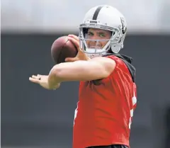  ?? Paul Chinn / The Chronicle ?? Derek Carr is the only QB to throw more than 80 touchdown passes and fewer than 40 intercepti­ons in his first three seasons.