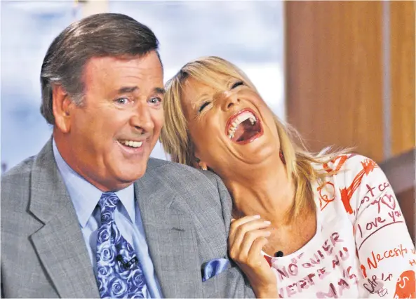  ??  ?? Endless mirth: Gaby Roslin and Sir Terry presenting their daytime talk show in 2003