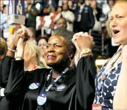  ??  ?? Delegates listen to the national anthem on the final day of the Democratic National Convention in Philadelph­ia.