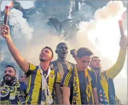  ??  ?? Ultra supporters of Turkish team Fenerbahce in 2019