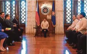  ?? REUTERS PIC ?? Philippine President Ferdinand Marcos Jr (centre) and United States Defence Secretary Lloyd Austin (seated, third from left) holding a discussion at the Malacanang presidenti­al palace in Manila yesterday.