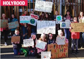  ??  ?? Edinburgh protest: Children gather outside parliament building HOLYROOD