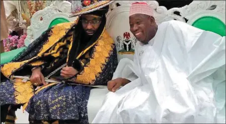  ?? Ibrahim Shuaibu ?? Emir of Kano, Alhaji Muhammadu Sanusi II (left), and Governor Abdullahi Ganduje, during a Sallah homage by the Emir to Government House in Kano...yesterday.