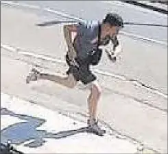  ?? ?? CCTV shows Smith fleeing the scene of the robbery