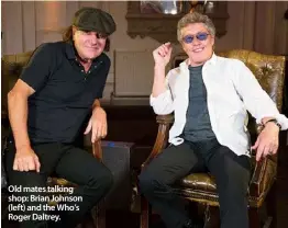  ??  ?? Old mates talking shop: Brian Johnson (left) and the Who’s Roger Daltrey.