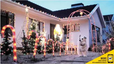  ?? TRACEY ADAMS African News Agency (ANA) ?? MATTHEW Heines, in Lady Grey Street, Fish Hoek, has put up a 15 000-light display in his garden for his family and the community to enjoy. |