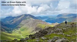  ?? ?? Hiker on Green Gable with views to Ennerdale Valley.