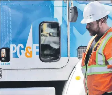  ?? Jeff Chiu Associated Press ?? STATE SEN. Scott Wiener said he began crafting legislatio­n to revamp PG&E after it shut off power to millions in an effort to prevent its lines from sparking fires. Above, a PG&E worker in San Francisco last summer.