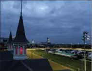  ?? THE ASSOCIATED PRESS ?? Horses train on the track before the 144th running of the Kentucky Oaks horse race at Churchill Downs Friday in Louisville, Ky. The 144th Kentucky Derby is Saturday.