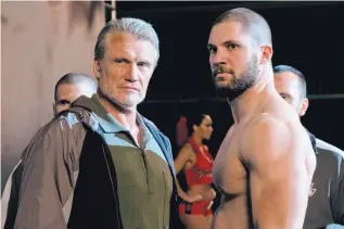  ?? COURTESY OF METRO GOLDWYN MAYER PICTURES/WARNER BROS. PICTURES ?? Dolph Lundgren, left, and Florian Munteanu in a scene from “Creed II.”