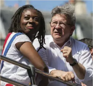  ??  ?? Danièle Obono et Jean-Luc Mélenchon à Paris lors de la « Fête à Macron », le 5 mai 2018.