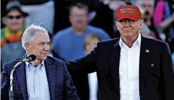  ?? JOHN BAZEMORE/AP ?? Sen. Jeff Sessions, R-Ala., left, an early supporter of Donald Trump, is the president-elect’s pick for attorney general.