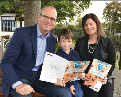  ??  ?? Launching the ‘stand up to bullying campaign for schools and clubs were Foreign Minister Simon Coveney, Kildorrery pupil Liam Drake and Aoife Griffin of the ISPCC.