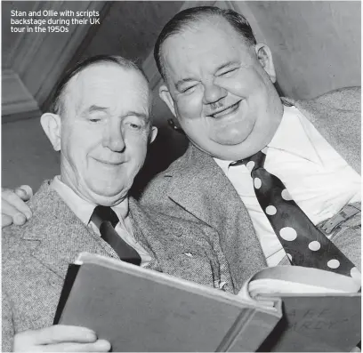  ?? ?? Stan and Ollie with scripts backstage during their UK tour in the 1950s