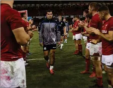  ??  ?? GUARD OF HONOUR: Wales players line up to applaud Scotland captain Stuart McInally and his men at the end of the encounter