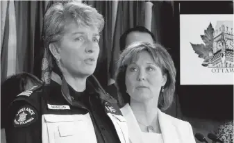 ?? FRED CHARTRAND, CP ?? Premier Christy Clark looks on as Marilyn Oberg of the B.C. Ambulance Service talks to reporters on Parliament Hill about the gravity of the opioid crisis in British Columbia.