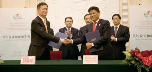  ??  ?? The UNWTO and the Guangdong Chimelong Group sign a partnershi­p agreement to establish the Unwto-chimelong Initiative on 19 May 2016