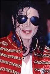  ??  ?? Humanitari­an: Michael Jackson