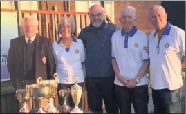  ??  ?? Sutton Bonington Bowls Club held their presentati­on dinner held at the Three Horse Shoes, East Leake David Bettany, won the Maiden Cup and went on to win the Men’s Four Wood Championsh­ip. The Lady’s champion was Linda Jackson. Grahame Lester won the Open Two Wood title as well as both the Two Wood pairs with Rob Russell and the Four Wood pairs with Trevor Jackson. The prizes were presented by club president, Michael Wright, who organised the event. Pictured from left to right: Grahame Lester, Lynda Jackson, Rob Russell, Trevor Jackson, David Bettany.