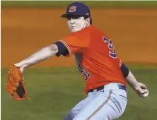  ?? AP PHOTO ?? NEXT CHAPTER: Auburn right-hander Casey Mize has a good chance to be taken by the Detroit Tigers as the No. 1 pick in the MLB draft, which begins tonight.