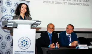  ?? (WZO) ?? NEWLY APPOINTED AMBASSADOR to Chile Marina Rosenberg addresses the World Zionist Organizati­on conference on antisemiti­sm in Chile last week.