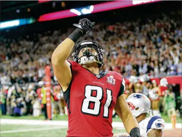  ?? CURTIS COMPTON/AJC ?? Falcons tight end Austin Hooper celebrates after catching a touchdown pass in the second quarter of Super Bowl LI. Hooper became a starter last season and caught 49 passes.